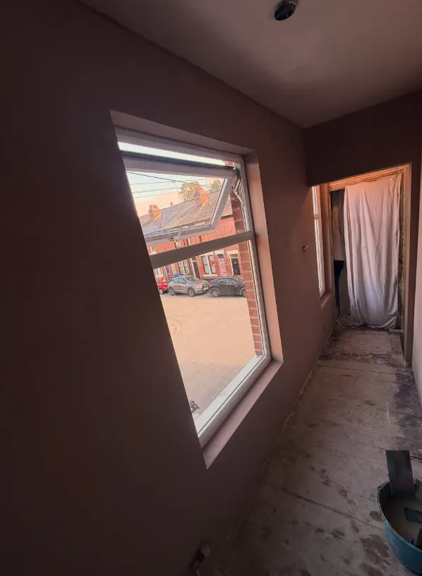 Plastering around a window